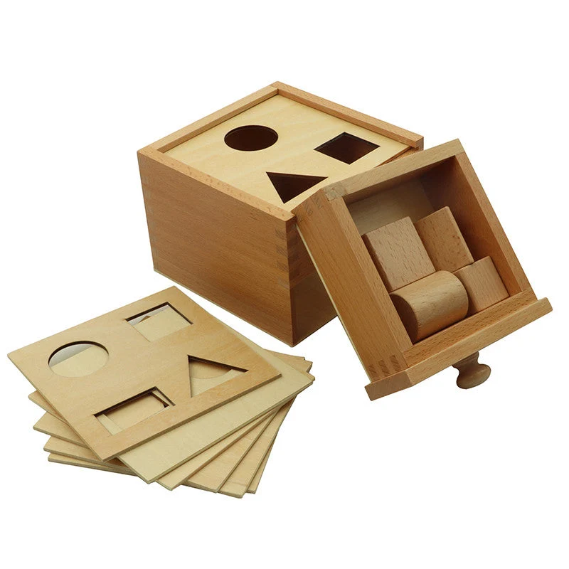 Boîte de permanence de l'objet avec 4 formes géométriques à encastrer