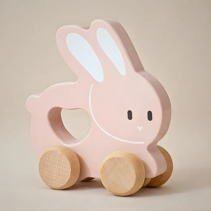 Petit Lapin rose à pousser en bois - Jouet bébé Montessori dès 1 an