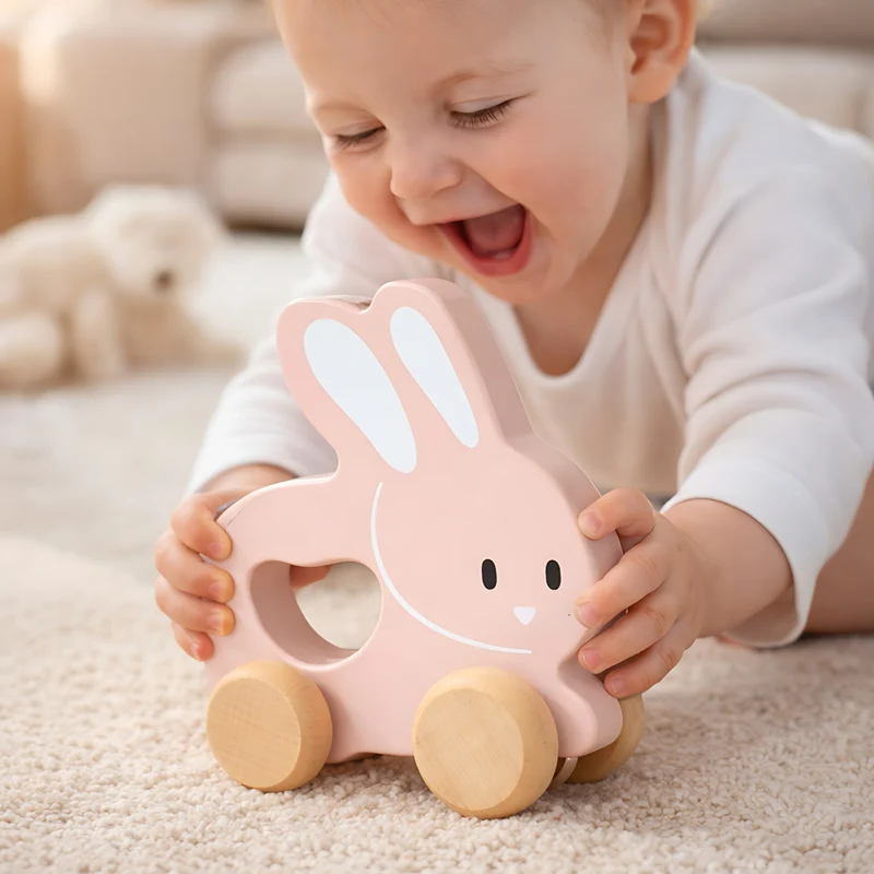 Petit Lapin rose à pousser en bois - Jouet bébé Montessori dès 1 an