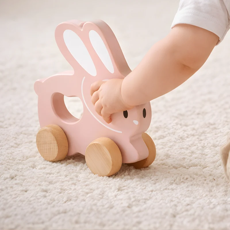Petit Lapin rose à pousser en bois - Jouet bébé Montessori dès 1 an
